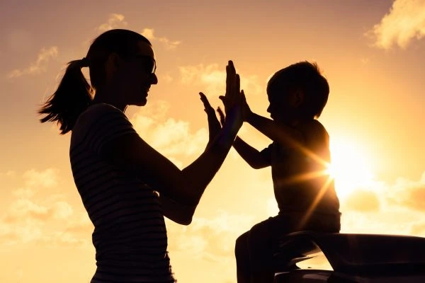 Image of happy mother and child after resolving child arrangements Gwent